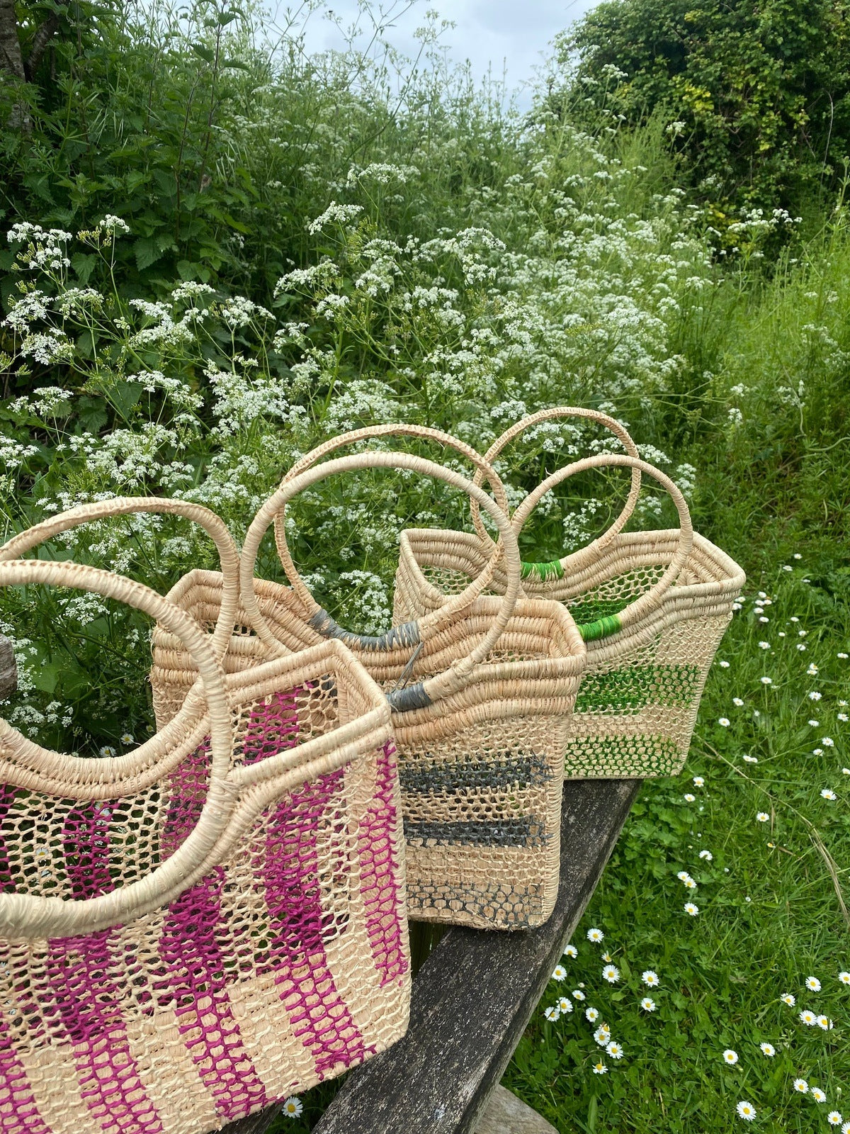 Hand woven raffia basket - green horizontal stripe