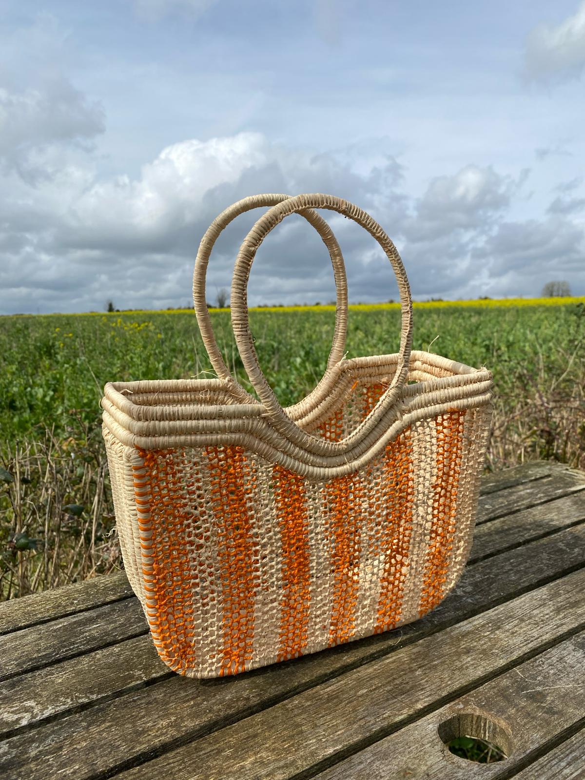 Hand woven raffia basket - orange